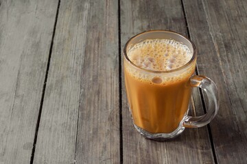 Hot drink tea with milk Malay called Teh Tarik is a popular breakfast drink in Malaysia