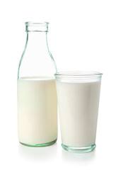 Bottle and glass of milk on white background