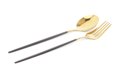 Golden spoon and fork with black handles on white background