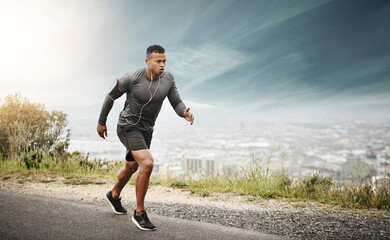 Man, runner and space in street with cityscape for exercise, wellness or music with mockup for health. African male running, listening and audio for focus, workout and outdoor with mock up on road - obrazy, fototapety, plakaty