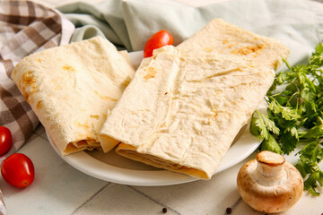 Plate with fresh lavash on white tile background