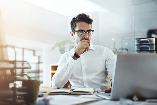 Laptop, thinking and business man in office, working on project or email. Computer, professional and male person problem solving, looking for solution or planning, reading or focus on decision making