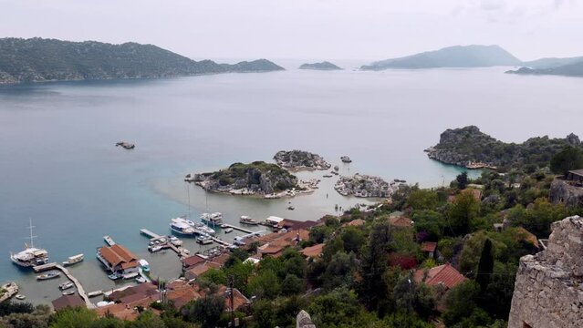 View over Mediterranean islands and Turkish village harbour of Simena