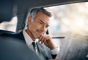 Business man, reading newspaper and car for travel, journey or drive while thinking of news. Professional male person with media paper in passenger seat for work with luxury transportation or a taxi