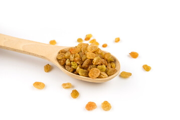raisins in a spoon isolated on white