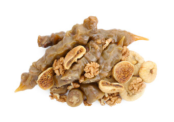 Delicious sweet churchkhelas with walnuts and dried figs isolated on white, top view