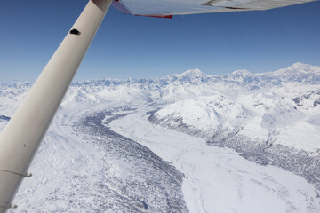 Fototapeta premium Glacier from airplane window over Mountain Denali