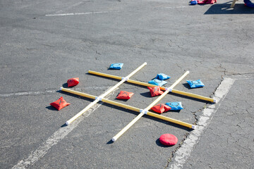 A view of a street tic tac toe game.