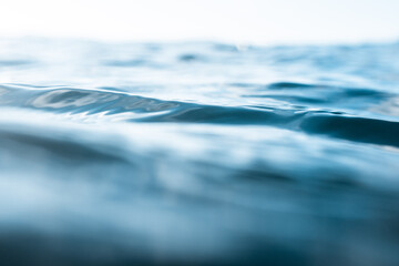 Low angle view of the blue ocean surface. selective focus