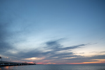 Colourful sunset sky. Full frame view of wispy colourful clouds up in the sky during sunrise or sunset hour. Sky replacement asset.