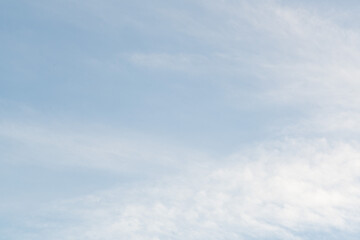 Colourful sunset sky. Full frame view of wispy colourful clouds up in the sky during sunrise or sunset hour. Sky replacement asset.