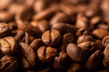 Close up image of Coffee beans. Roasted coffee beans. Arabica Coffee Beans. Single Origin. Coffee Bean texture.