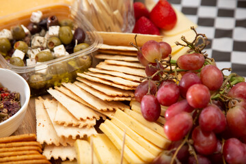 A closeup view of a cheese board.
