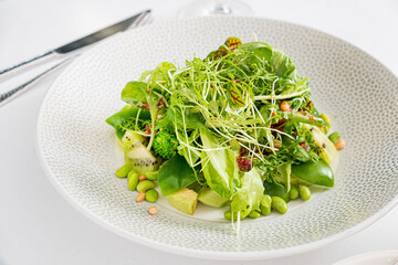 green salad on the white plate