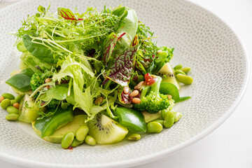 green salad on the white plate