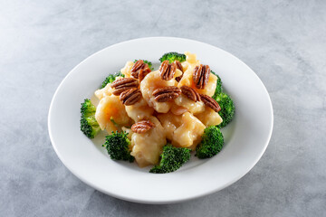  A view of a plate of honey pecan shrimp.