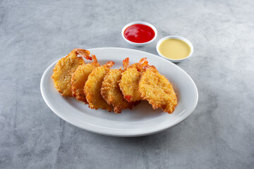 A view of a plate of fried shrimp.