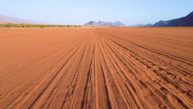 Sand road in Marienfluss valley in Kaokoveld in Namibia, Africa.