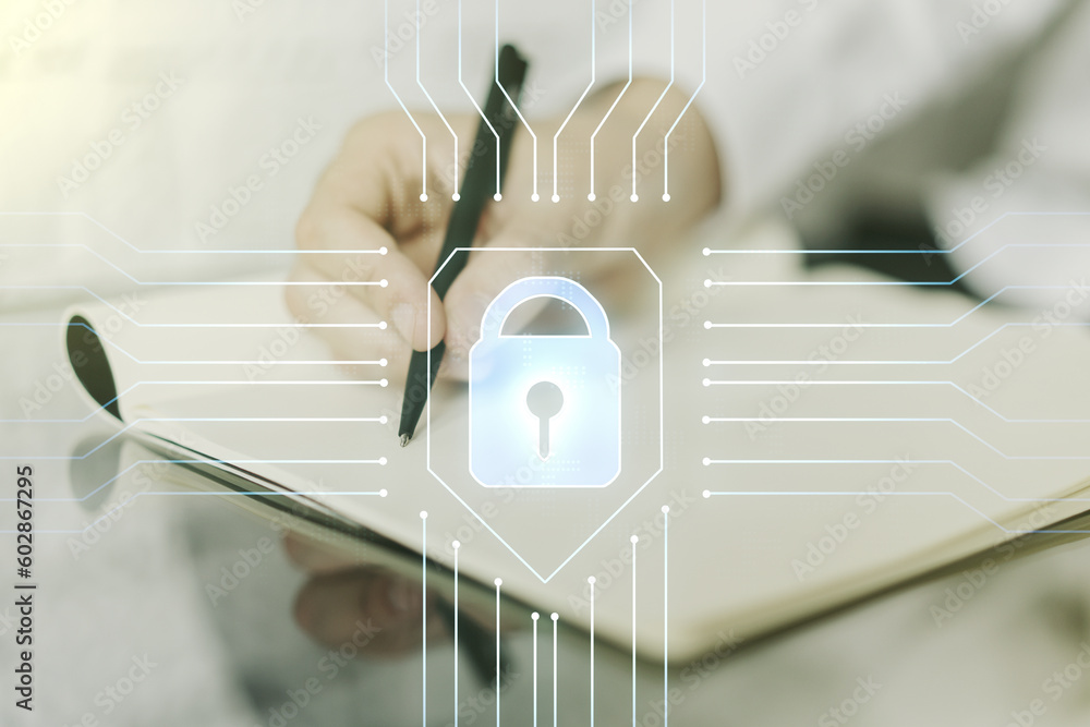 Aufkleber creative lock sketch with chip hologram and man hand writing in notepad on background, protection of