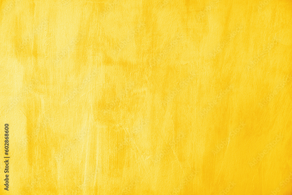 Wall mural Yellow wall abstract background texture