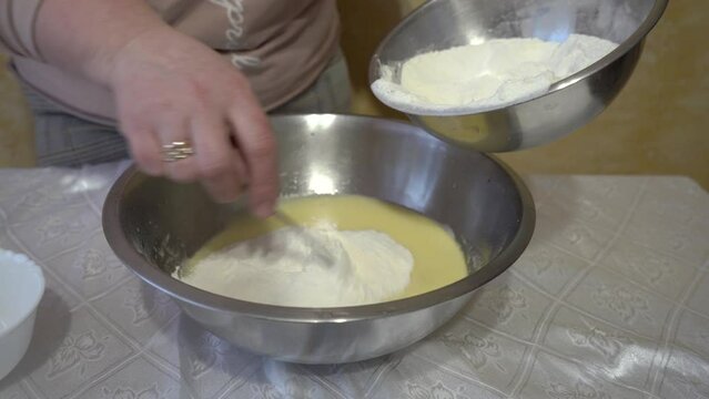 pour flour to the dough,pour flour into a bowl, knead the dough