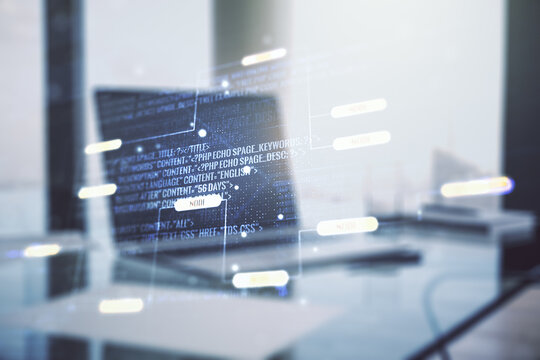 Double exposure of abstract programming language on laptop background, research and development concept