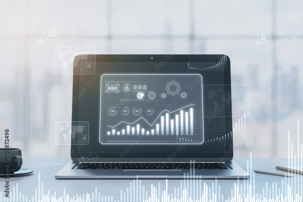 Poster close up of laptop at office workplace with glowing business chart hologram on blurry window with ci