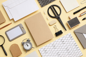 Mockup flat lay with different office accessories on beige background