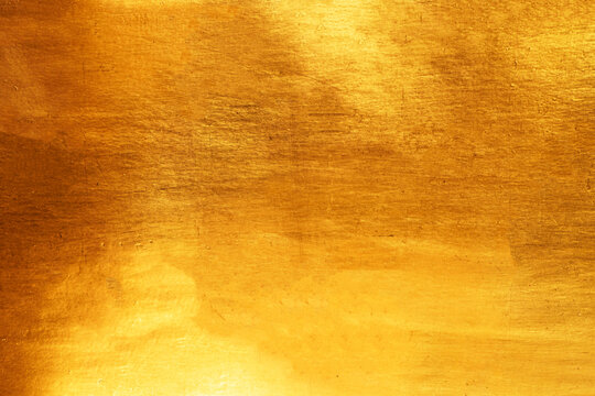 Old glod metal wall background or texture and shadow