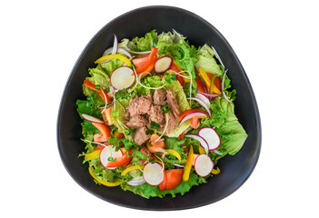 Tuna salad with radish, arugula,  and tomatoes isolated on white background