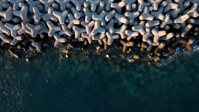 Tetrapod Concrete Breakwater Protecting the Coast from Erosion
