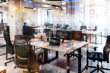 Modern office workplace with desks and computers