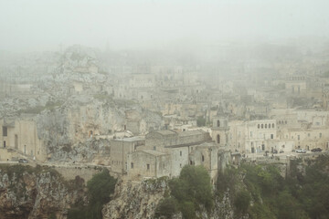 Panoramic cityscape of Matera Italy jewel of Basilicata - cave dwelling Sassi di Matera from viewpoint Belvedere of Murgia Timone