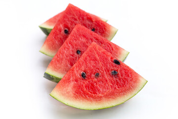 Watermelon slices on white background.