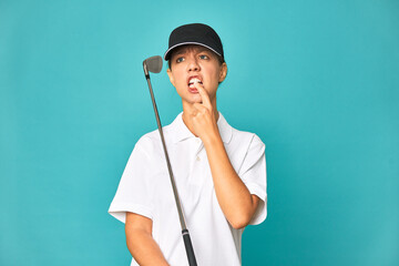 A young caucasian golfer woman relaxed thinking about something looking at a copy space.