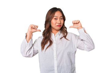 A young chinese woman feels proud and self confident, example to follow.