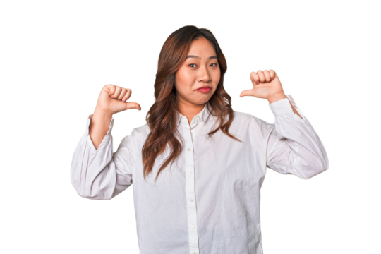 A young chinese woman feels proud and self confident, example to follow.