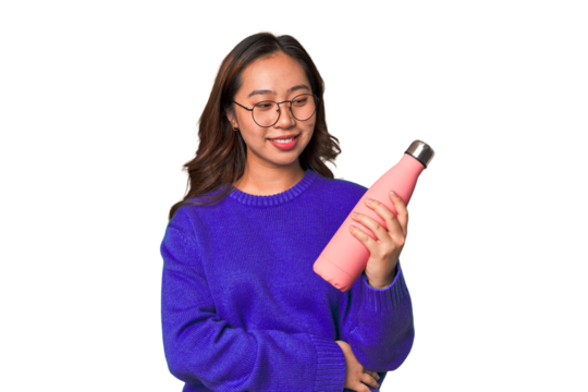 A young asian woman holding a pink thermo bottle - Powered by Adobe