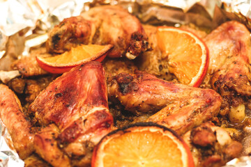 Baked chicken wings with honey and orange.