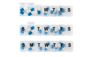 Daily meds organizer cut out, the concept of taking medication.