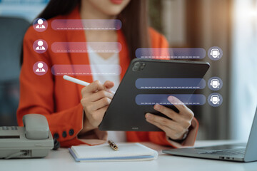 Woman online chatting with AI chat bot on tablet. Artificial intelligence robot innovation technology communicate and answer questions with smart conversation and provide creative solution ideas.