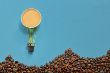 Abstract Hot Air Balloon from Espresso Cup and Miniature People.
