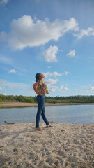 a woman enjoying the beauty of the beach