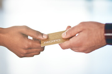 Fototapeta premium Hands, payment and finance with a card retail or shopping between a customer and teller in a store closeup. Money, sale and membership with a person spending their budget in a mall for consumerism