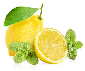 whole and a slice of lemon with sprigs of mint on a white isolated background