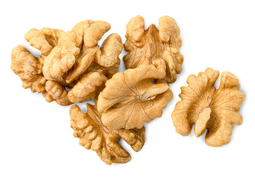 heap peeled walnut on a white isolated background, top view