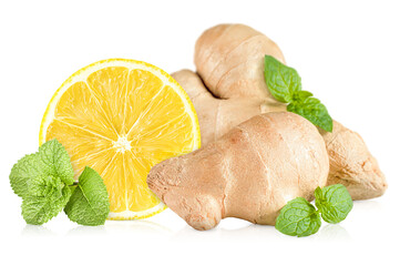 ginger root, lemon slice and sprigs of mint on a white isolated background