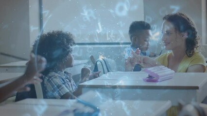 Animation of data processing over diverse female teacher and schoolboy signing at desk in class - Powered by Adobe