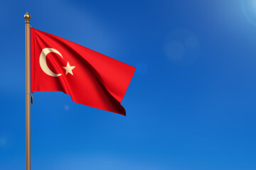 Turkey. Flag blown by the wind with blue sky in the background.