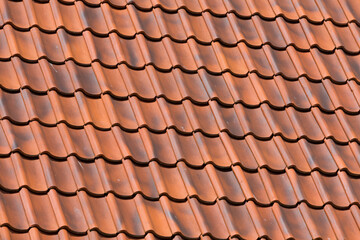 Red tiles roof background